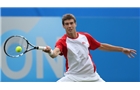 EASTBOURNE, ENGLAND - JUNE 14: Remi Boutillier of France plays a forehand against Ken Skupsi of Great Britain during their Men's Singles qualifying match on day one of the Aegon International at Devonshire Park on June 14, 2014 in Eastbourne, England.  (Photo by Steve Bardens/Getty Images)
